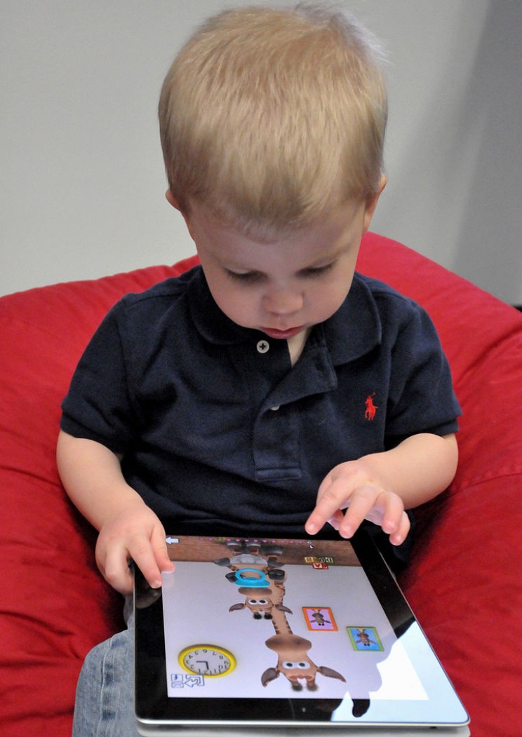 Child with iPad Child with iPad