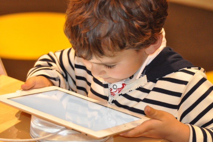 Child Using Tablet Child Using Tablet