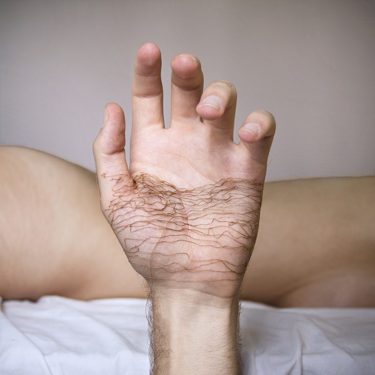 This Artist Stitches the Palm of His Hand to Create Haunting Images This Artist Stitches the Palm of His Hand to Create Haunting Images