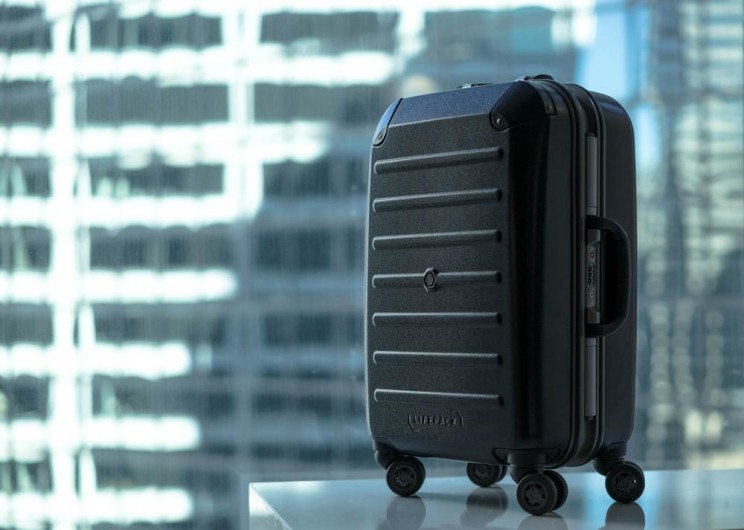 This Clever Carry-On Suitcase Has Its Own Retractable Shelving System