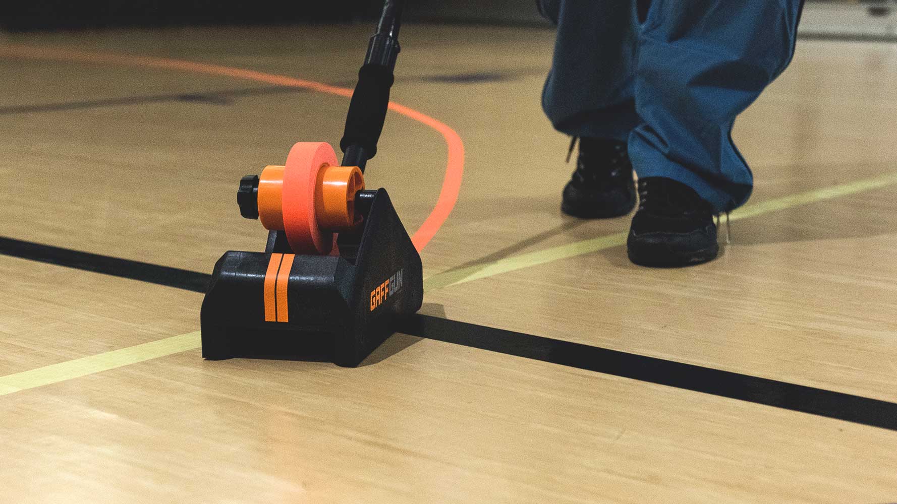 This Great Gadget Lets You Tape Down Cables Faster Than Ever This Great Gadget Lets You Tape Down Cables Faster Than Ever