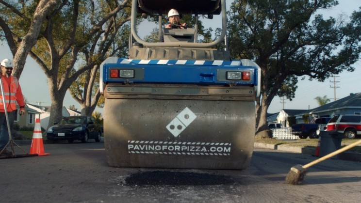 Domino's Pizza is Filling Potholes Across US Streets Domino's Pizza is Filling Potholes Across US Streets