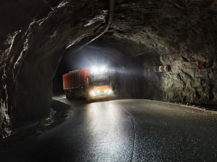 The autonomous trucks traverse through tunnels
