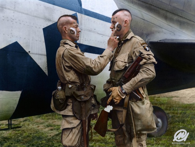 Filthy Thirteen Member Clarence Ware Applies War Paint To Charles Plaudo. England, 31 December 1943.
