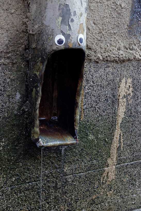 Street pipe with googly eyes