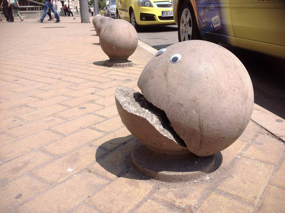 Street boulder with googly eyes