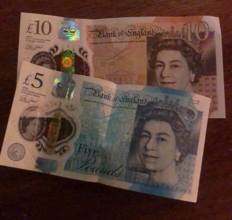 plastic with paper-looking characteristics printed money