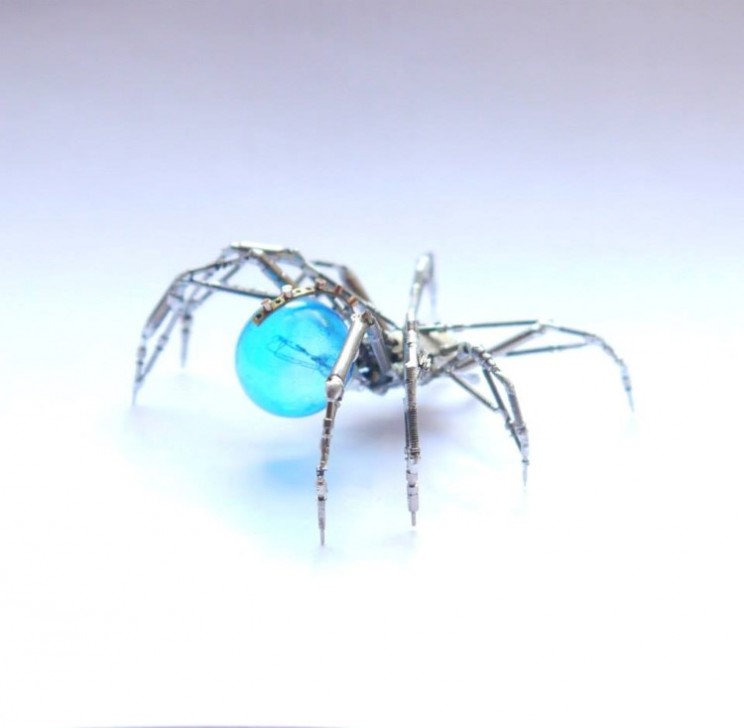 The Watch Spider is made from parts of an old watch