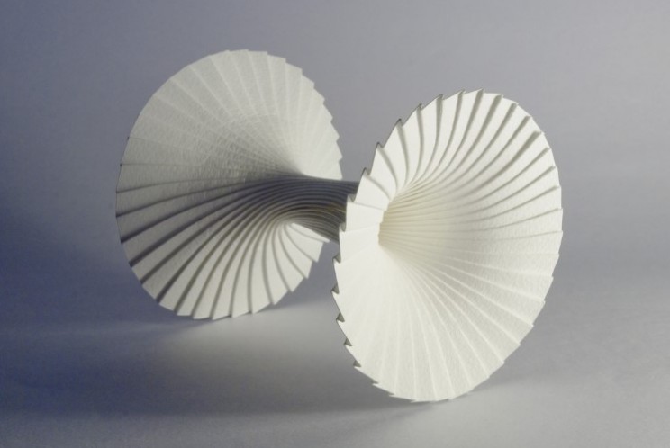 Modular paper sculptures intricately formed by artist