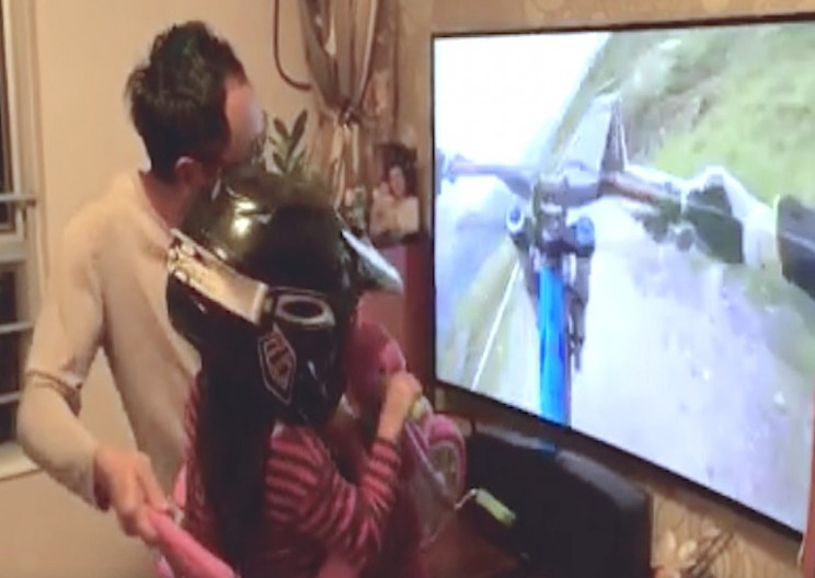 Watch this Dad Simulate Mountain Biking for His Daughter