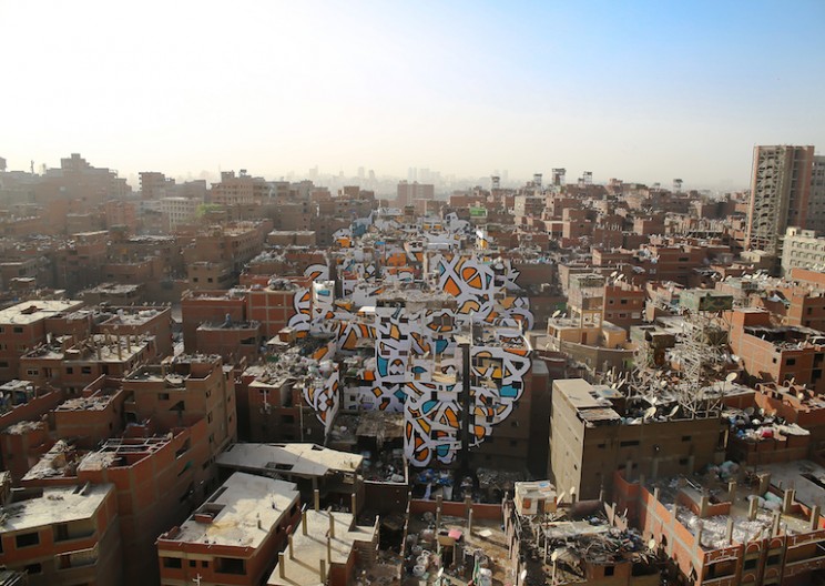 Artist Illegally Creates Giant Mural Across City