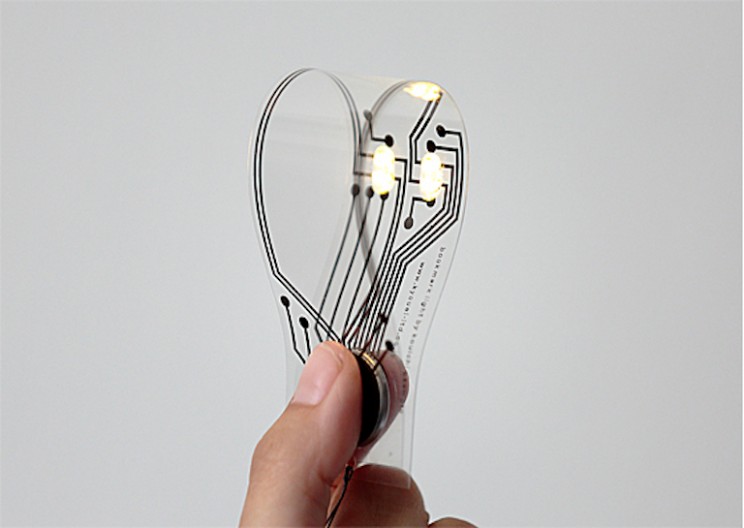 Thin Bookmark Turns Into a Light When Pinched