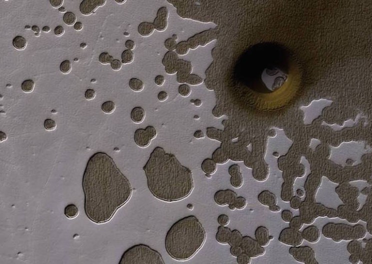 NASA Can't Explain This Giant Hole on Mars