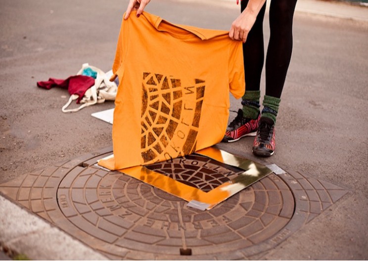 "Pirate Printers" are Using Manholes to Print Custom T-Shirts