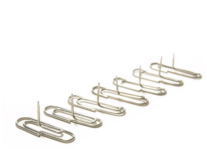 Paperclip thumbtack lets you pin photos without leaving a hole
