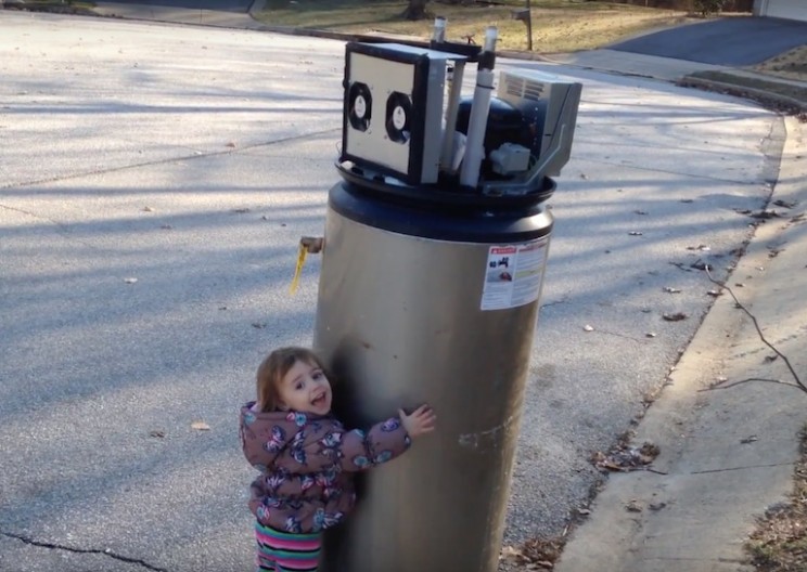Adorable Little Girl Mistakes An Old Water Heater For A Robot