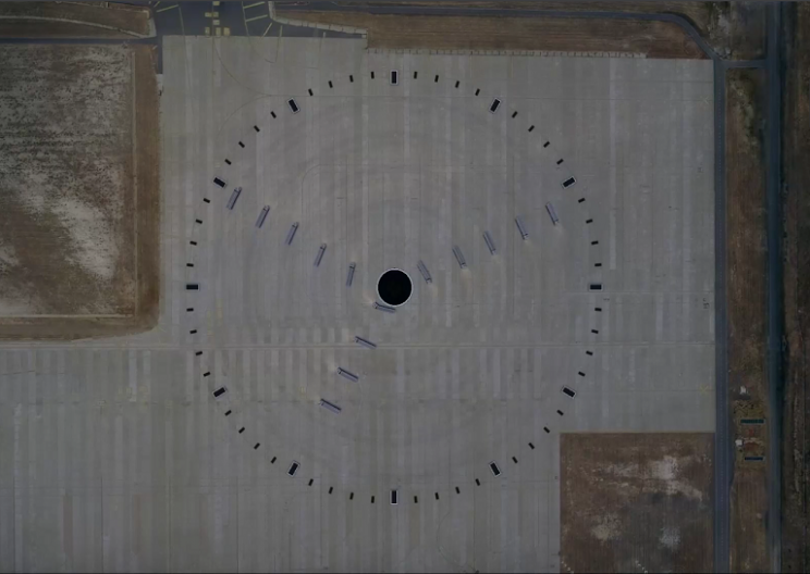 14 Trucks Work in Unison to Make a Giant Clock