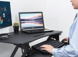 Boost Your Productivity and Posture with This Adjustable Desktop Riser