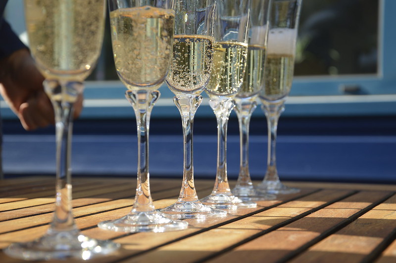 popping champagne glasses