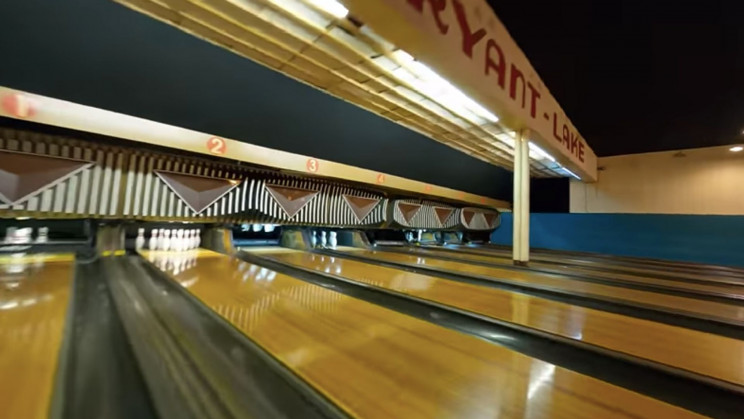 Watch a Drone Seamlessly Fly Through a Bowling Alley