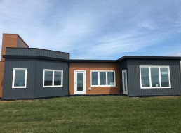 Builder Creates a Home Out of 612,000 Plastic Soda Bottles