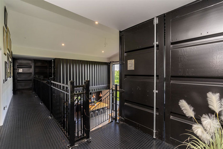 Before and After Images Show House Built Using 12 Shipping Containers Before and After Images Show House Built Using 12 Shipping Containers