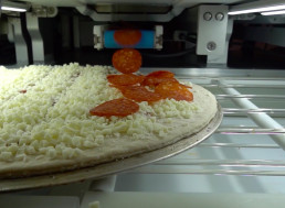 Pizza Robot Capable of Making 300 Pizzas Per Hour Served CES Attendees