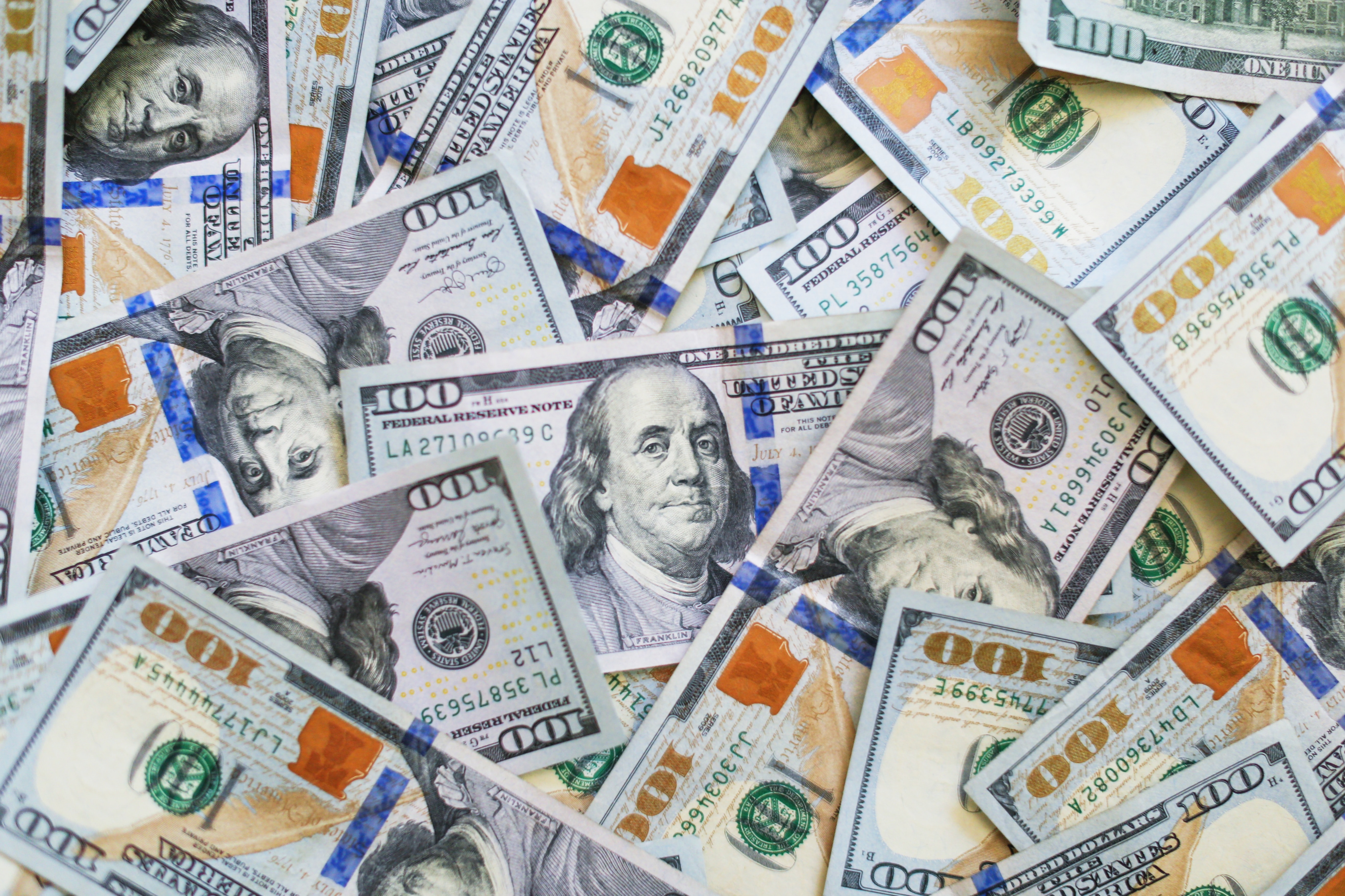 Money makes the world go round Image of money containing $100 bills