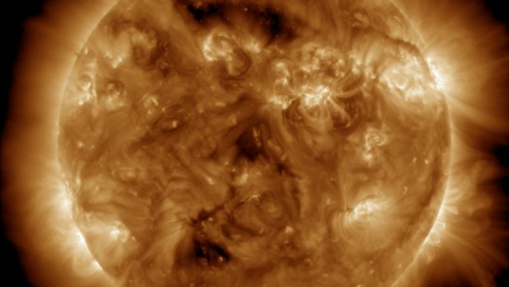 A massive sunspot that is facing right at us is now 3 times bigger than Earth. Should we worry?