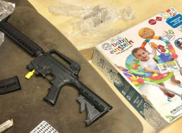 Woman Finds Semi-Automatic Rifle Inside Goodwill Baby Bouncer Box