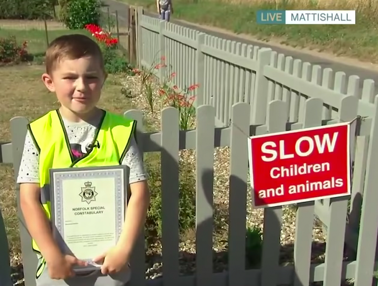 7-Year-Old 'Polices' Speeding Cars with a Scowl after His Cat Was Killed 7-Year-Old 'Polices' Speeding Cars with a Scowl after His Cat Was Killed