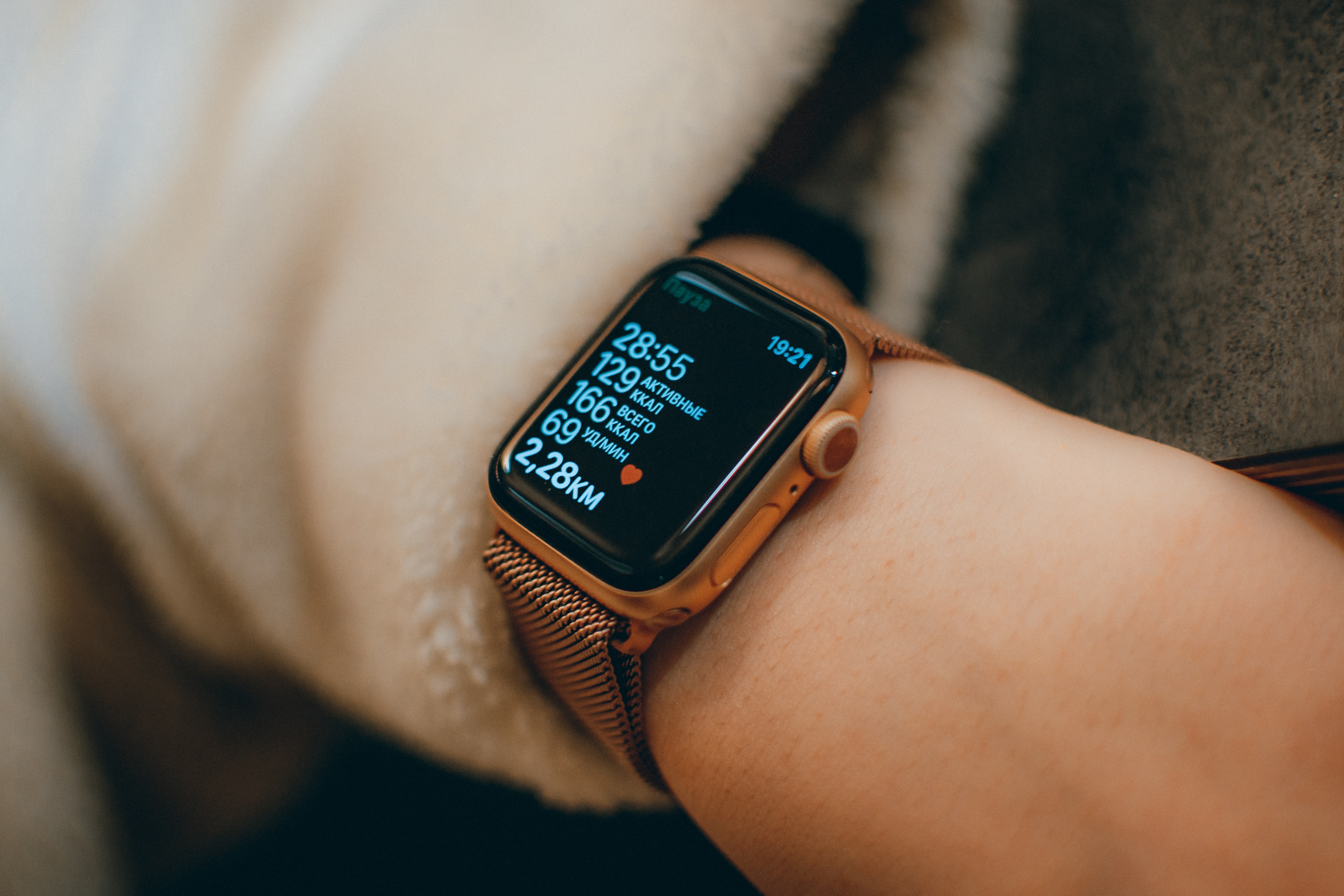 An Apple Watch displays biometrics on its screen.