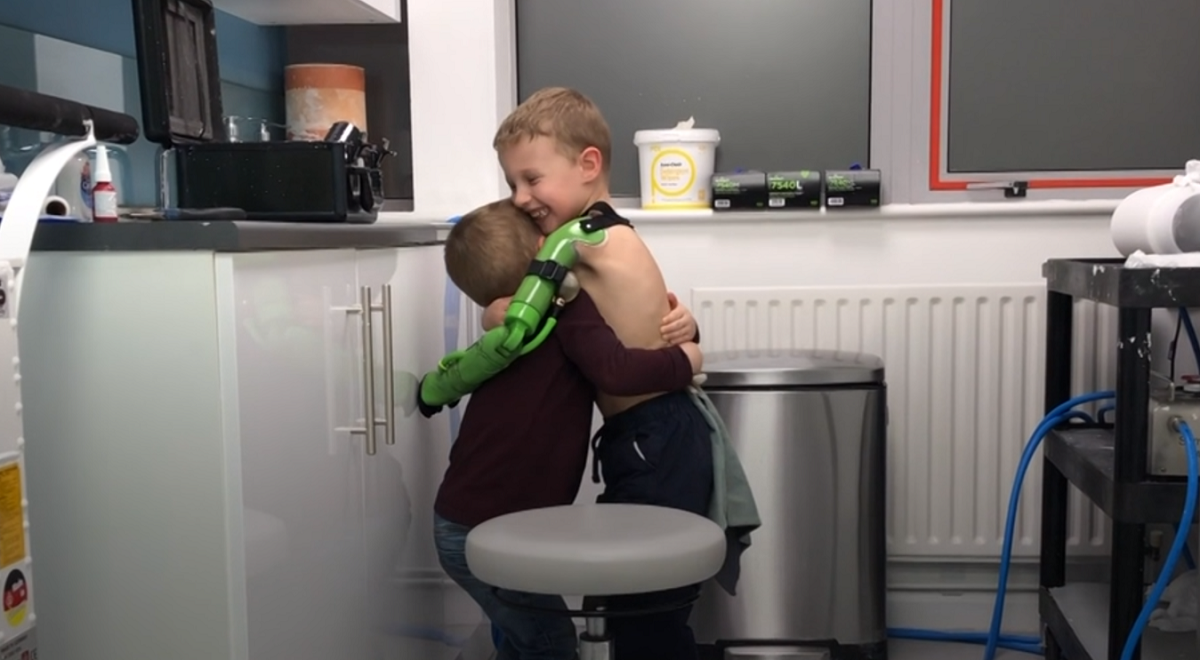 Jacob Scrimshaw Jacob Scrimshaw hugging his brother