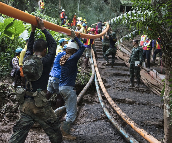 Rescuers pumping water Rescuers pumping water