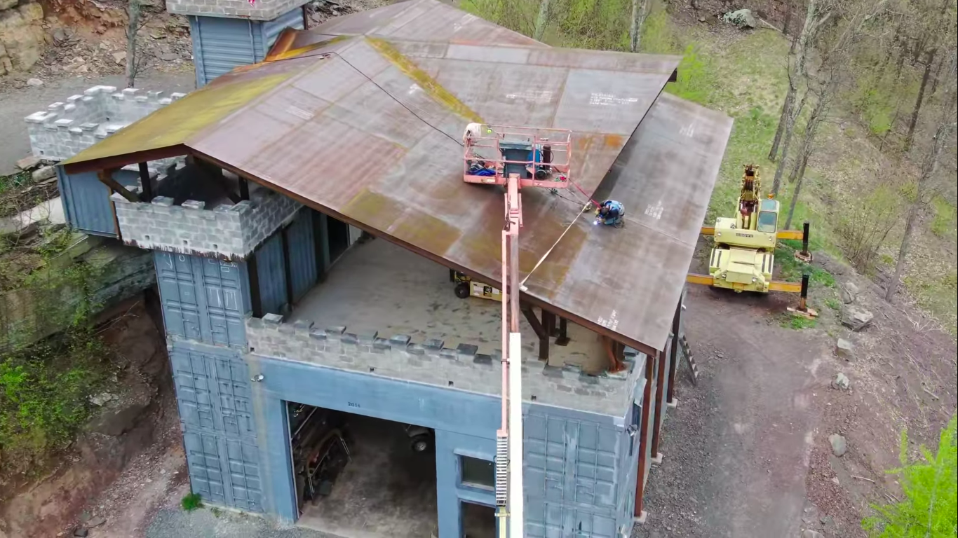 Guy Builds a Modern Castle out of Shipping Containers Guy Builds a Modern Castle out of Shipping Containers