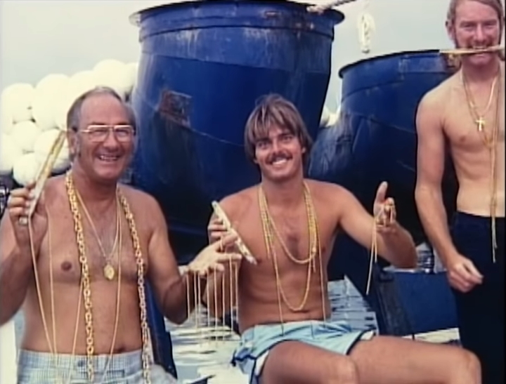 Mel Fisher (left) and divers Mel Fisher (left) and divers