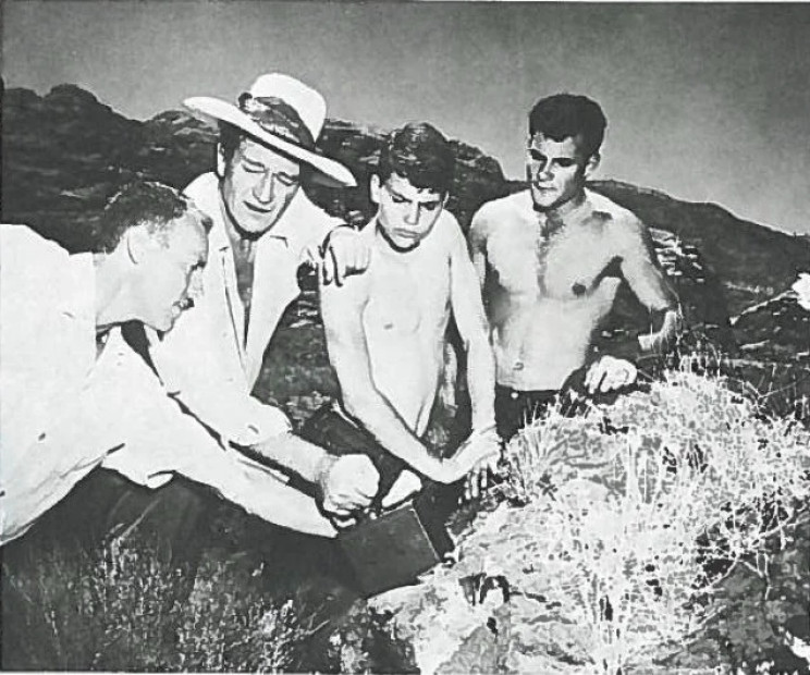 John Wayne using a Geiger counter John Wayne using a Geiger counter