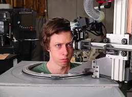 Guy Builds a Robot Barber to Get His Hair Cut With Scissors