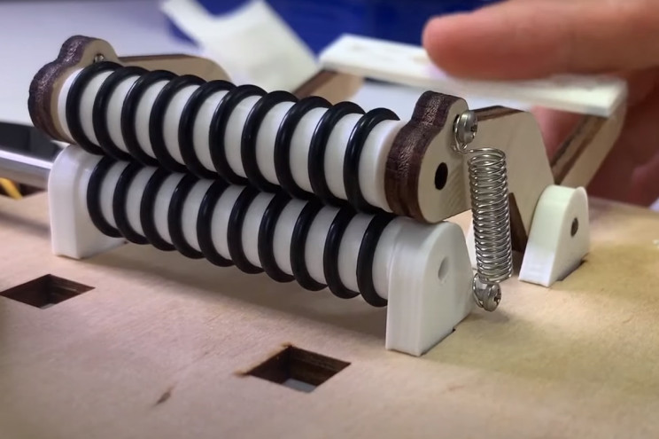 encouragement machine paper feeder