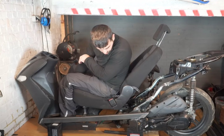 futuristic scooter seat frame