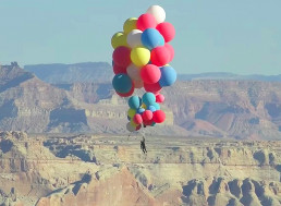 David Blaine Flies 25,000 Feet into the Sky Using 52 Helium Balloons