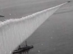 Military Plane Drops a Smokescreen to Hide Ships in 1923 Footage