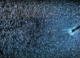 Watch a Spark Plug Go Through a Car Window at 800,000 FPS