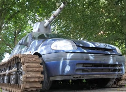 Junkyard engineer modifies a Clio with steel tank tracks