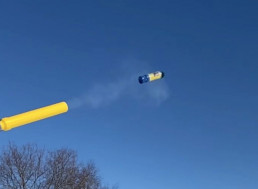 Man Shoots Twisted Teas From a Cannon, Smashes Hole through a Door