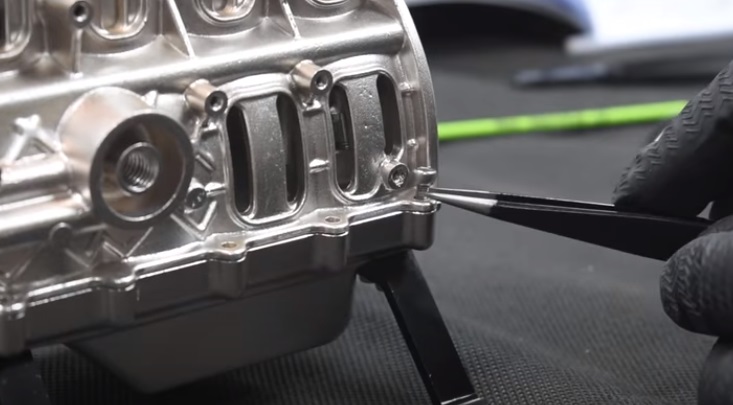 v4 engine model oil pan