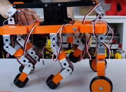 Watch This Cute Home-Made Robot Climb Over Obstacles