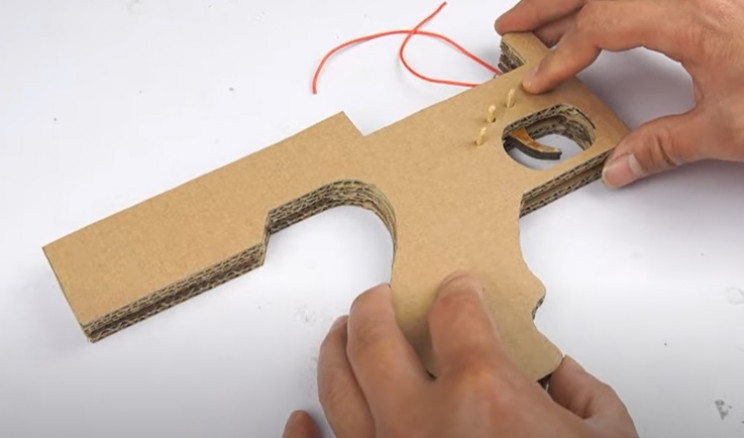 diy cardboard tommy gun close body