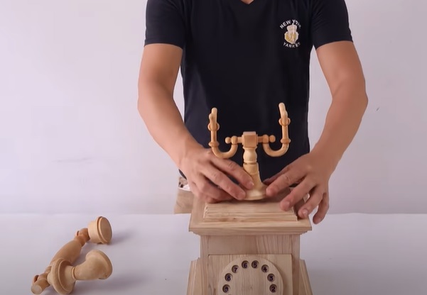 wood antique phone to plinth