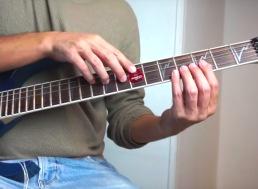 Watch This Musician Emulate the Sound of a French Horn, Trumpets, and More with His Guitar